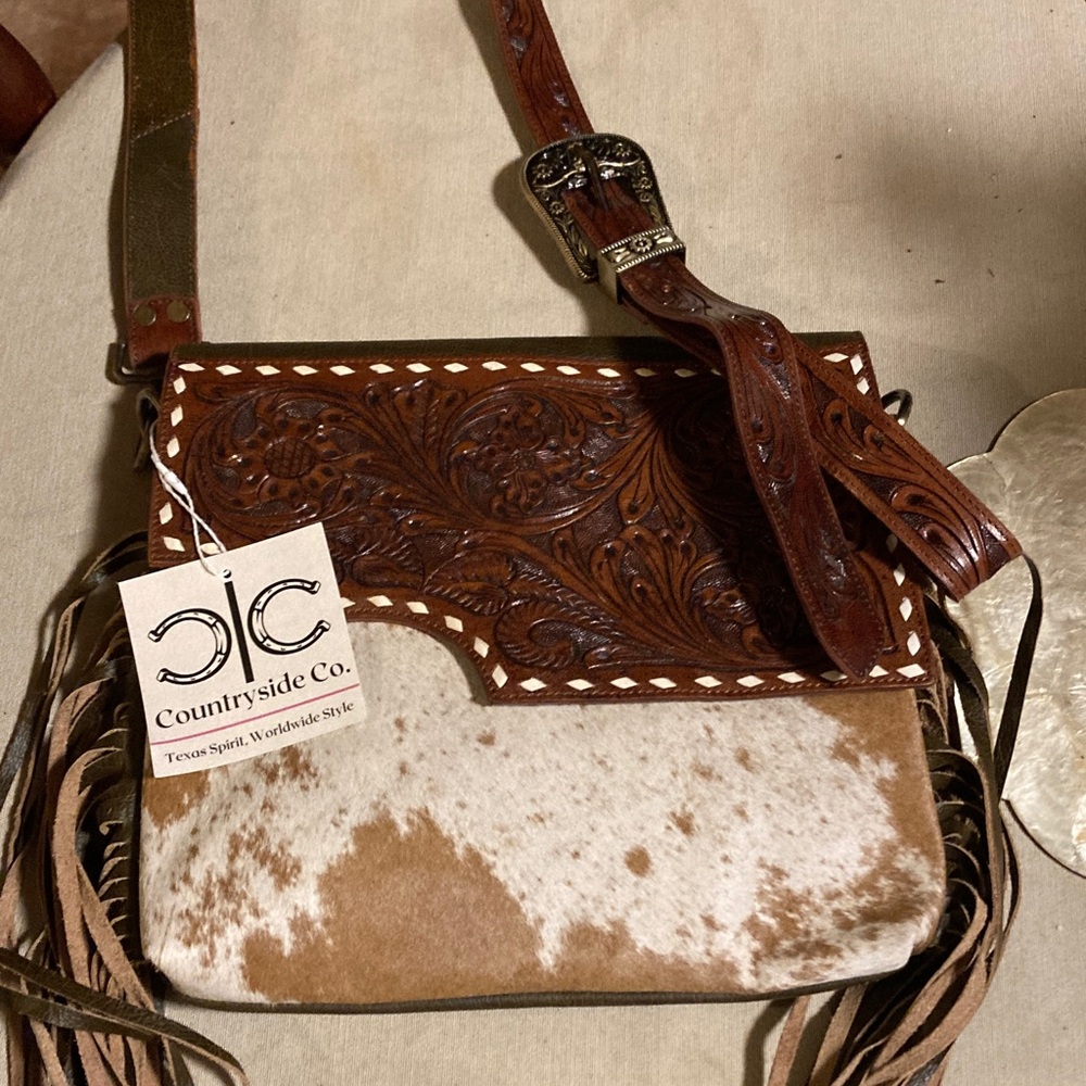 Countryside Co cowhide and leather cross body purse.